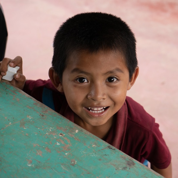 Photo of a happy smiling kid from Guatemala